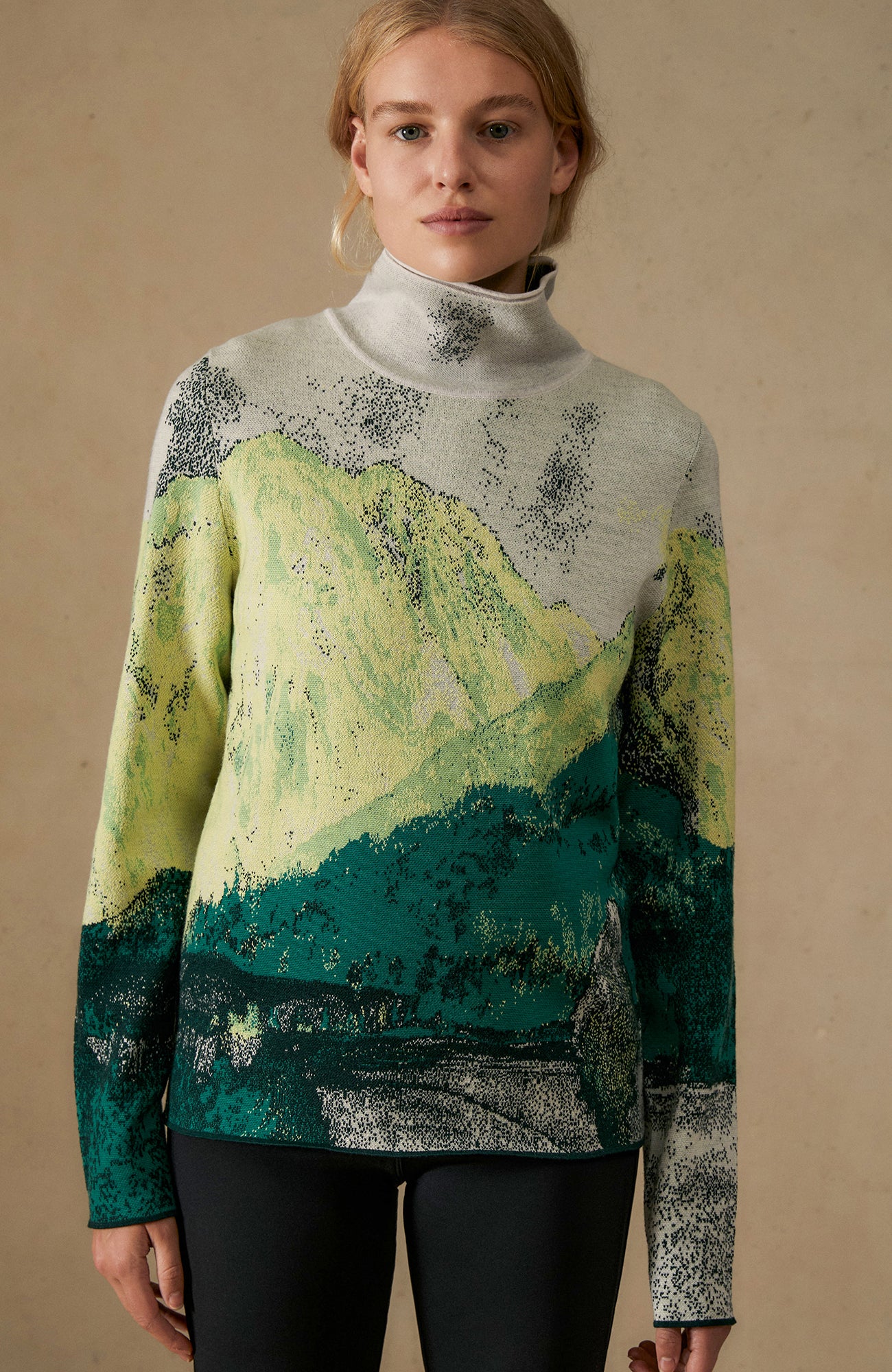 Yellowstone sweater with a mountain motif  