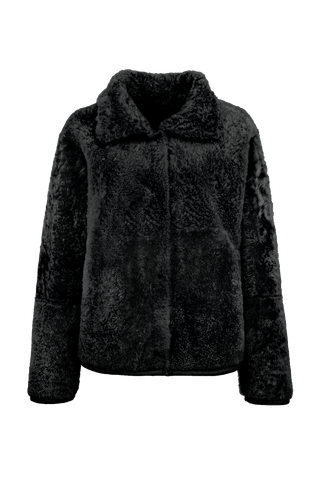 Damen Lammfellcape Modell Dolli in der Farbe midnight Vorderansicht fellseite – edles Cape aus weichem Lammfell mit fließendem Schnitt, stilvoll und wärmend für die kalte Jahreszeit.“