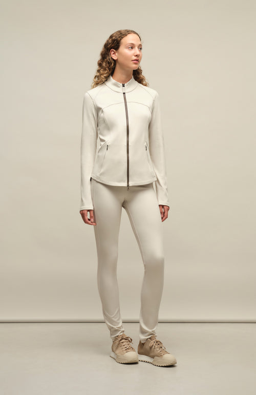 Damen-Legging Daphne-NP aus Natural Powerstretch mit glatter, glänzender Oberfläche, schmale Passform, taillenhoher Bund, sehr bequem durch eingearbeiteten Gummibund. In der Farbe Weiß-Beige (Farbe: sandstone)
