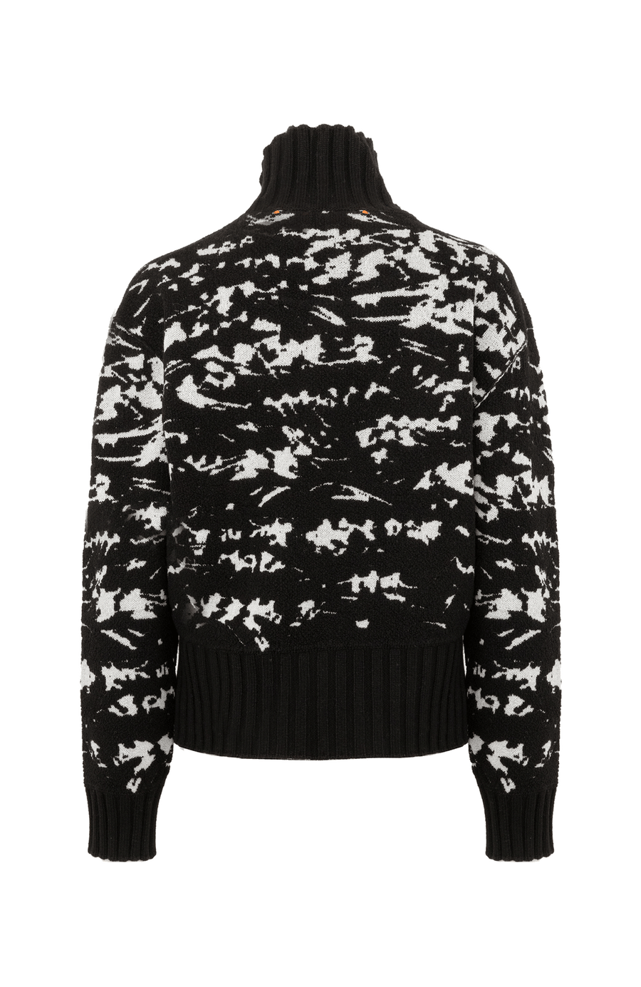 Frotteestrickpullover aus feinstem Merino Extrafine, wendbar, Jacquard Design, leicht, weich und dennoch fest, temperaturausgleichend. Bündchen und Stehragen aus Cashmere Ripstrick, seitliche Schlitze, verkürzte Passform, überschnittene Schulterpartie. In der Farbe Schwarz (Farbe: black)