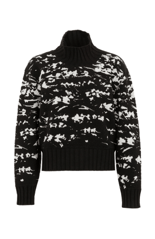 Frotteestrickpullover aus feinstem Merino Extrafine, wendbar, Jacquard Design, leicht, weich und dennoch fest, temperaturausgleichend. Bündchen und Stehragen aus Cashmere Ripstrick, seitliche Schlitze, verkürzte Passform, überschnittene Schulterpartie. In der Farbe Schwarz (Farbe: black)