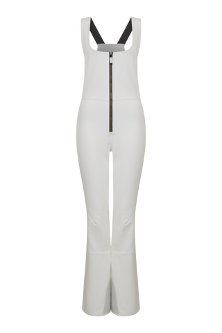 Ski-Catsuit Davina2.0-S im Latzhosen-Stil ohne Ärmel, schmaler figurbetonter Schnitt mit ausgestelltem Bein und femininer Bustier-Ausschnitt. Streifen an den Beinaußenseiten aus Alcantara-Leder, Träger hinten aus elastischem Gummi, ergonomisches Knie, langer Zipper, auffallende Nähte, Seitentaschen mit Zip, Kantenschutz aus Alcantara-Leder und Schneefang. Enganliegend und feminin, betont die Silhouette und Bewegungsfreiheit. In der Farbe milchig/weiß (Farbe: cloud)