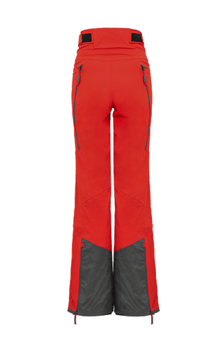 Damen-Skitourenhose aus atmungsaktivem, wind- und wasserfestem 3-Layer-Material mit RECCO®-System, verschweißten Nähten, seitlichen Bein-Zippern, Schneefang, robustem Kantenschutz aus Alcantara-Leder und lockerem Schnitt. In der Farbe Rot (Farbe: ruby)